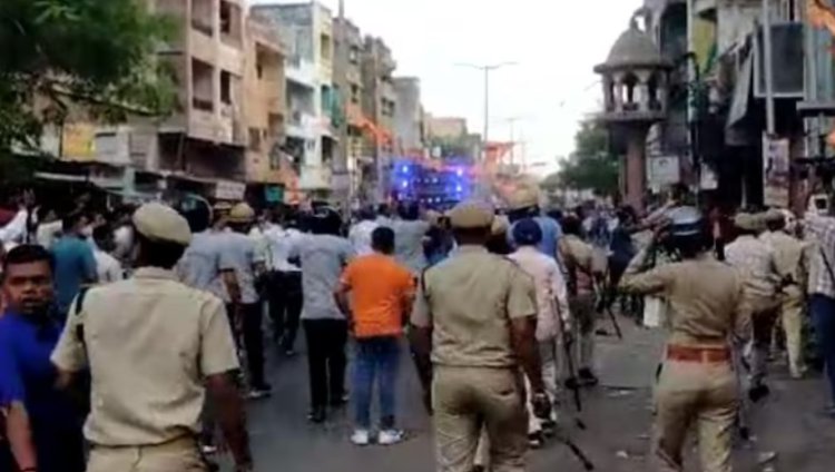 Police arrive at the scene after more stone-pelting at the Ram Navami procession in Vadodara.