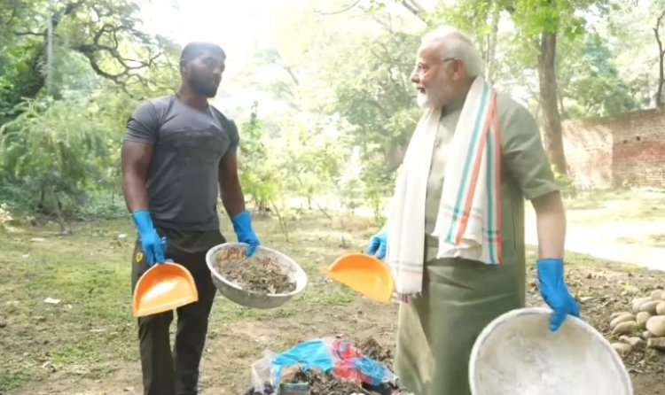 PM's cleaning crusade with wrestler: 'all about Swachh, Swasth Bharat vibe'