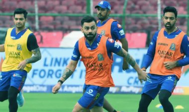 Glenn Maxwell and Virat Kohli square off during RCB's pre-game football session in Jaipur.