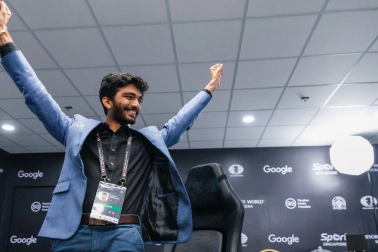 Watch: D Gukesh fulfils his promise during the photoshoot and lifts the World Chess Championship trophy.