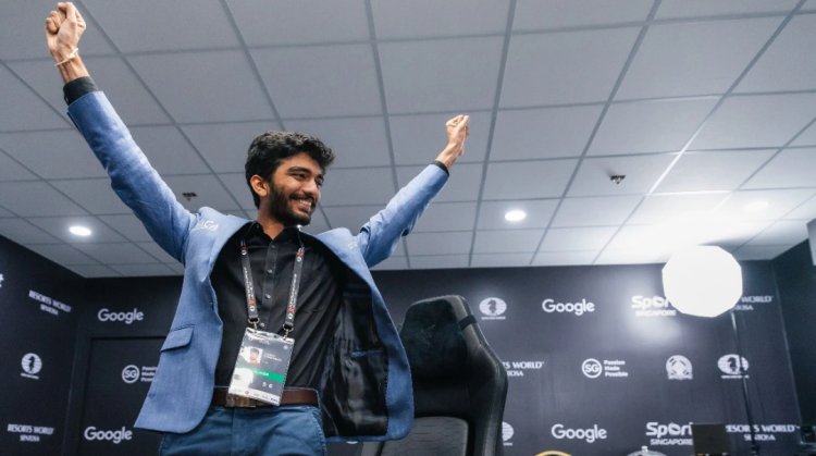 Watch: D Gukesh fulfils his promise during the photoshoot and lifts the World Chess Championship trophy.