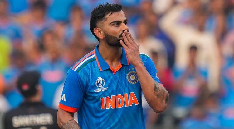 Tendulkar applauds from the stands as Virat Kohli celebrates his historic 50th ODI century at the Wankhede Stadium
